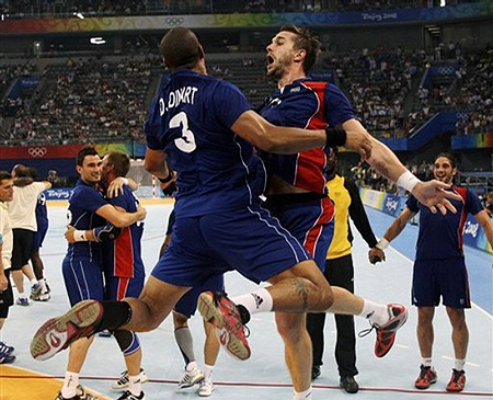  France's Didier Dinart, left, and Nikola Karabatic celebrate after the men's handball gold medal match at the Beijing 2008 Olympics in Beijing